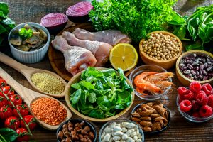 Food products representing the MIND diet created to reduce dementia and the decline in brain health. Mediterranean-DASH Intervention for Neurodegenerative Delay